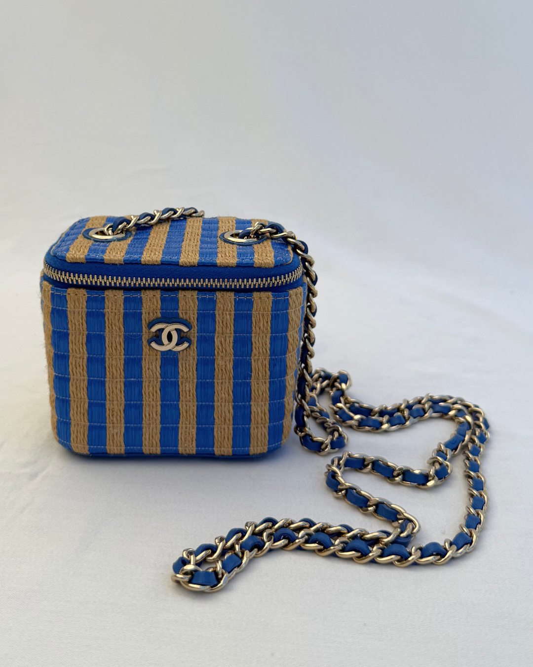Main image front angle of Chanel 2021 Raffia Mini Vanity Case blue and raffia striped leather pre-loved vintage handbag