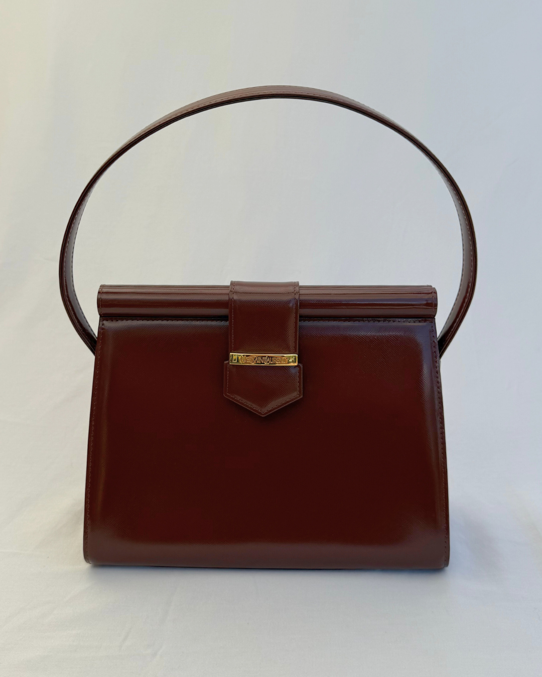 Front view of Saint Laurent Vintage Brown Leather Shoulder Bag vintage handbag on white background