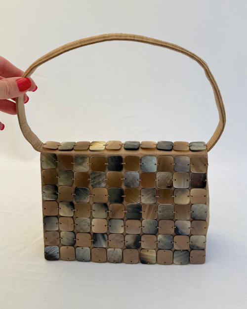 Front view of the Bottega Veneta 1997 Rare Vintage Canvas Top Handle Bag neutral mother of pearl detailing