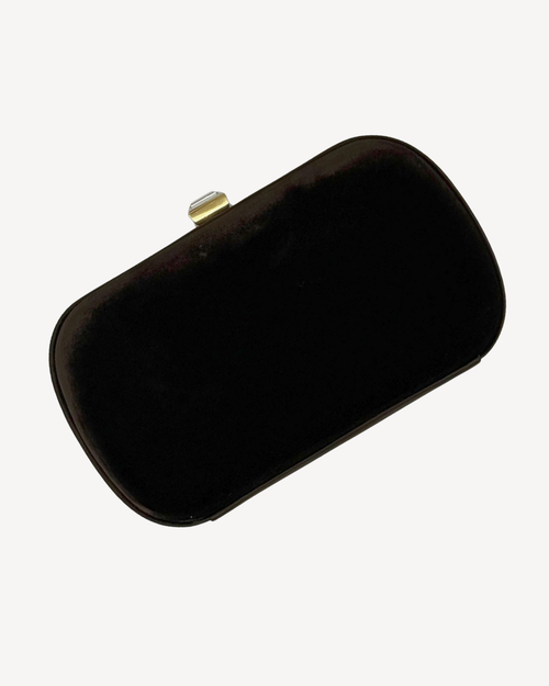 Brown velvet vintage clutch bag with a gold crystal snap closure on a white background