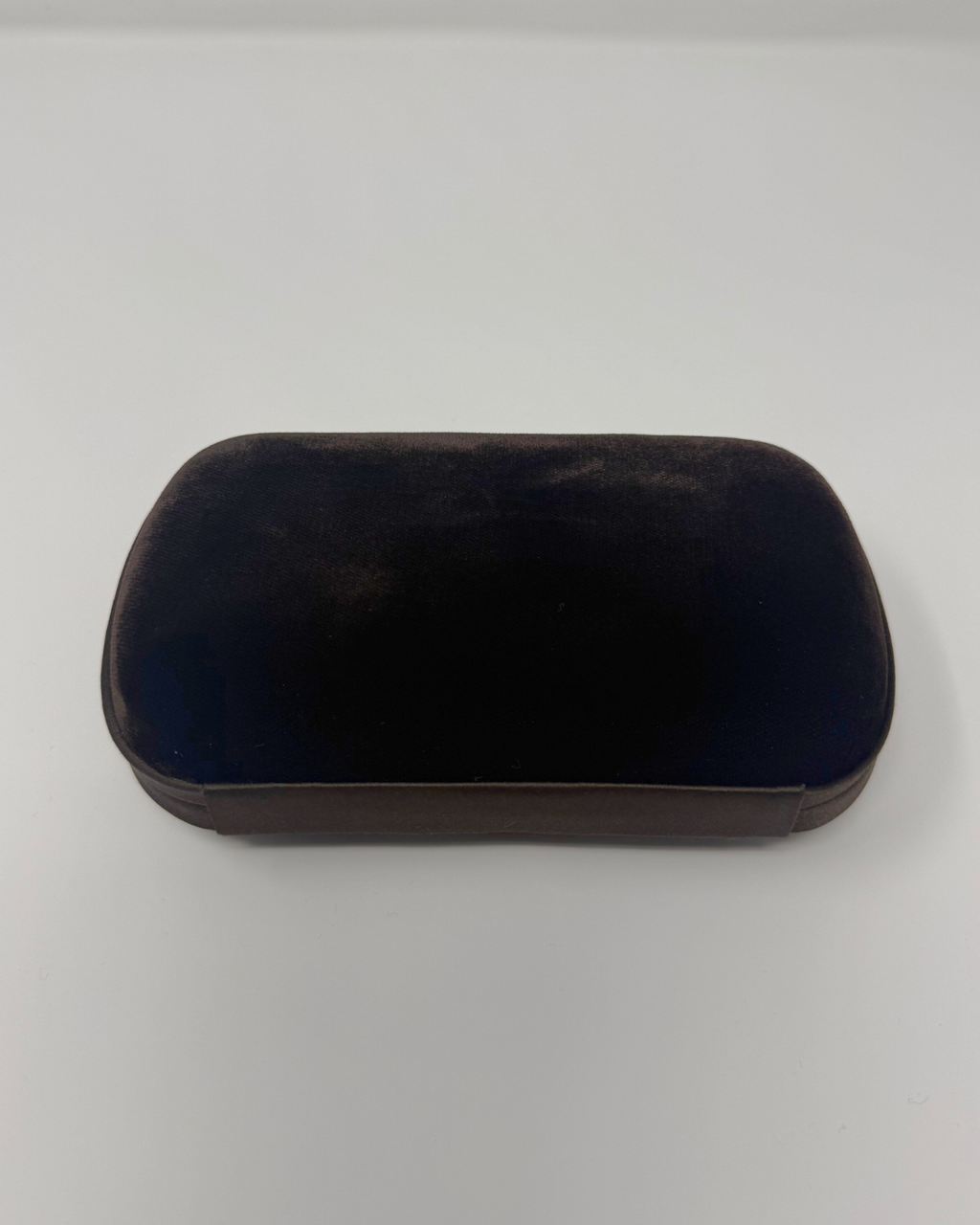 Brown velvet rectangular clutchvintage on a white background