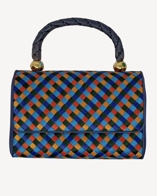 Colorful checkered handbag with a patterned handle on a white background