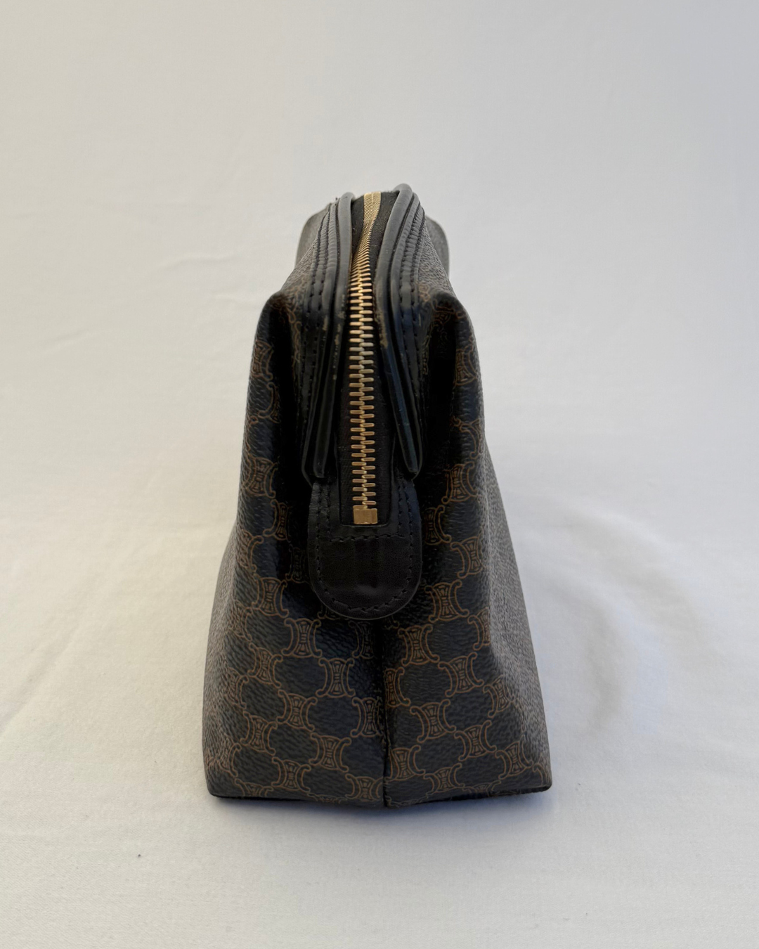 Side view of Celine Vintage Macadam Portfolio Brown Cosmetic Bag on white background
