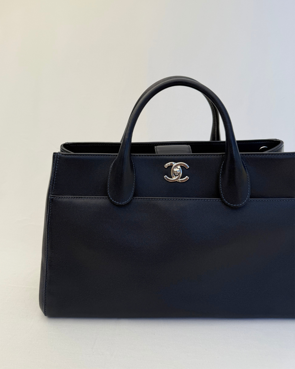 Up close image of the Chanel 2015 Medium Executive Cerf Caviar Leather Tote Bag Navy Blue Vintage