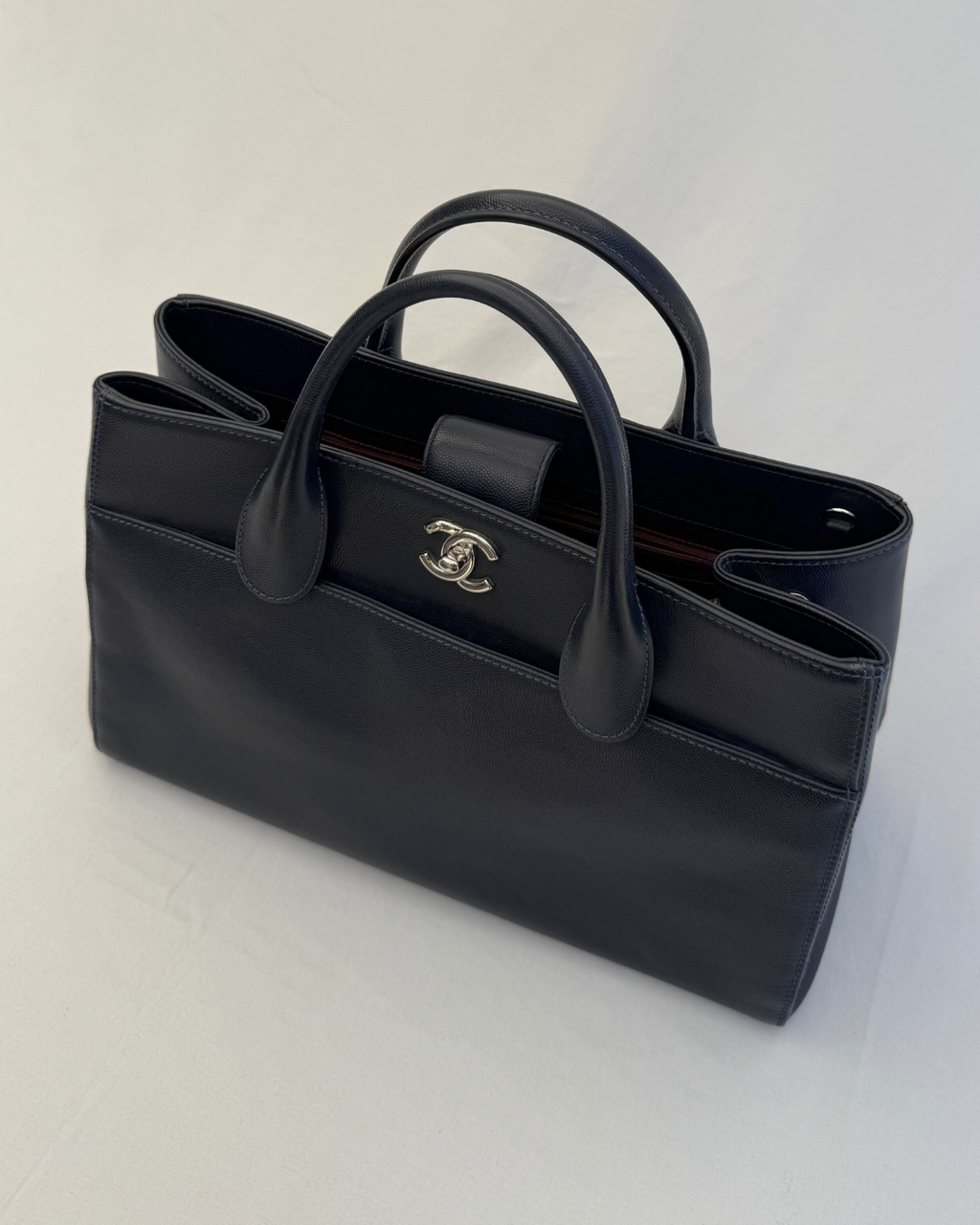 Top profile and view of the Chanel 2015 Medium Executive Cerf Caviar Leather Tote Bag Navy Blue Vintage
