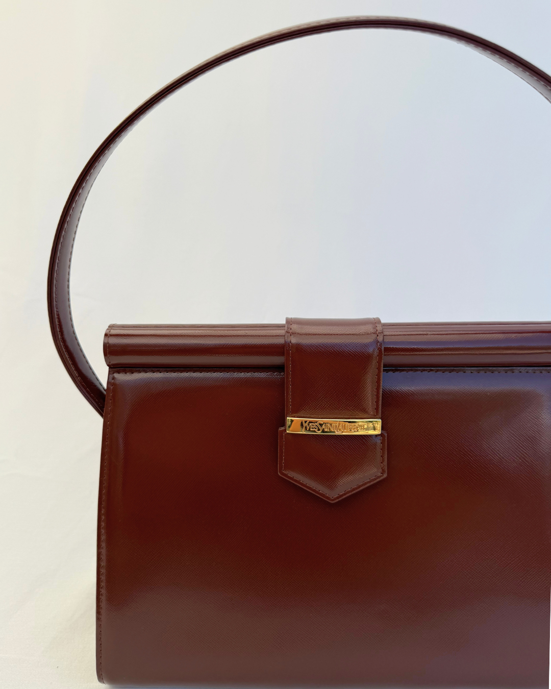 Close up detail view of Saint Laurent Vintage Brown Leather Shoulder Bag on white background