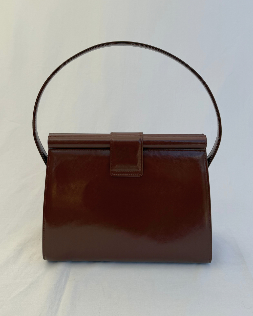Back view of Saint Laurent Vintage Brown Leather Shoulder Bag vintage handbag on white background