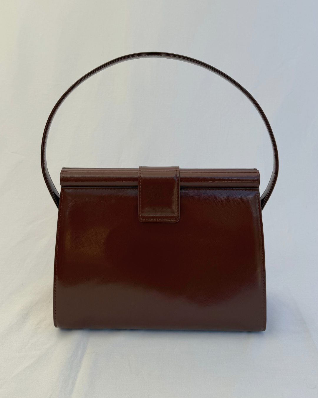 Back view of Saint Laurent Vintage Brown Leather Shoulder Bag vintage handbag on white background